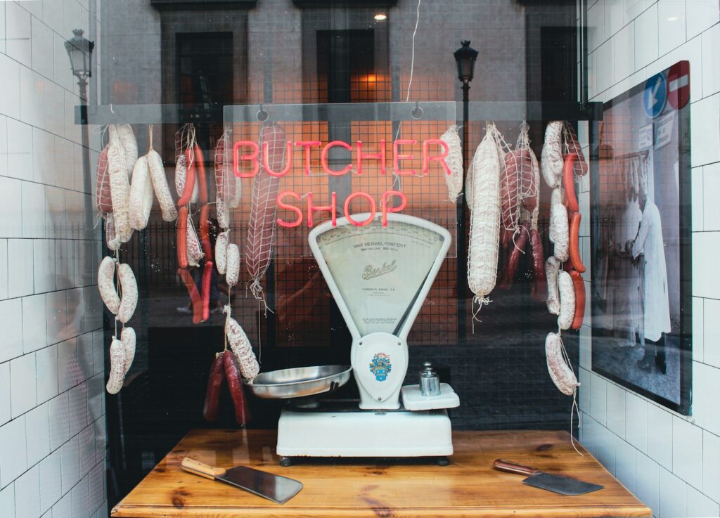 Traditional butcher shop interior with product on display